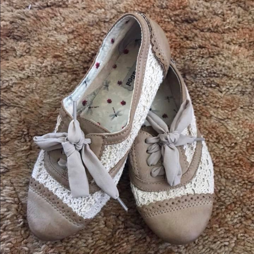 Cream and white flat shoes